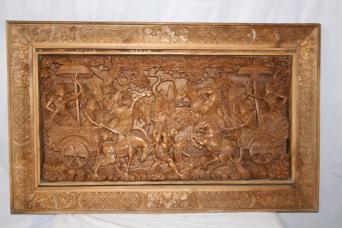 Tableau en bois sculpté